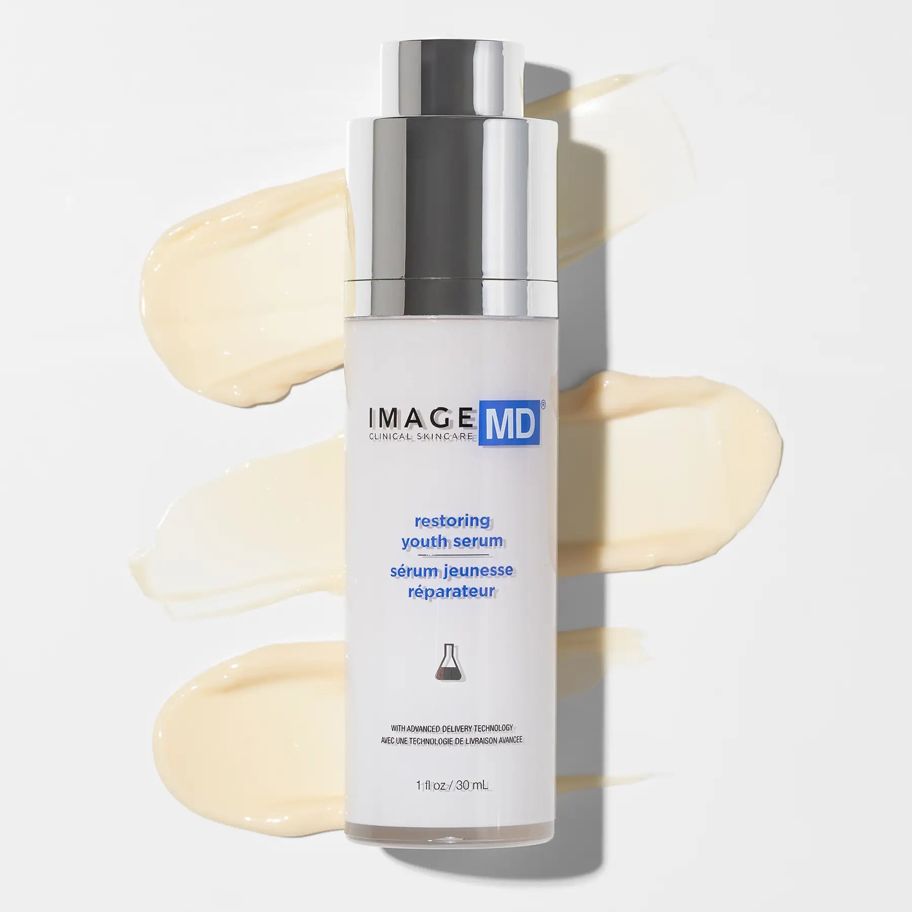 IMAGE MD restoring youth serum bottle with a white background