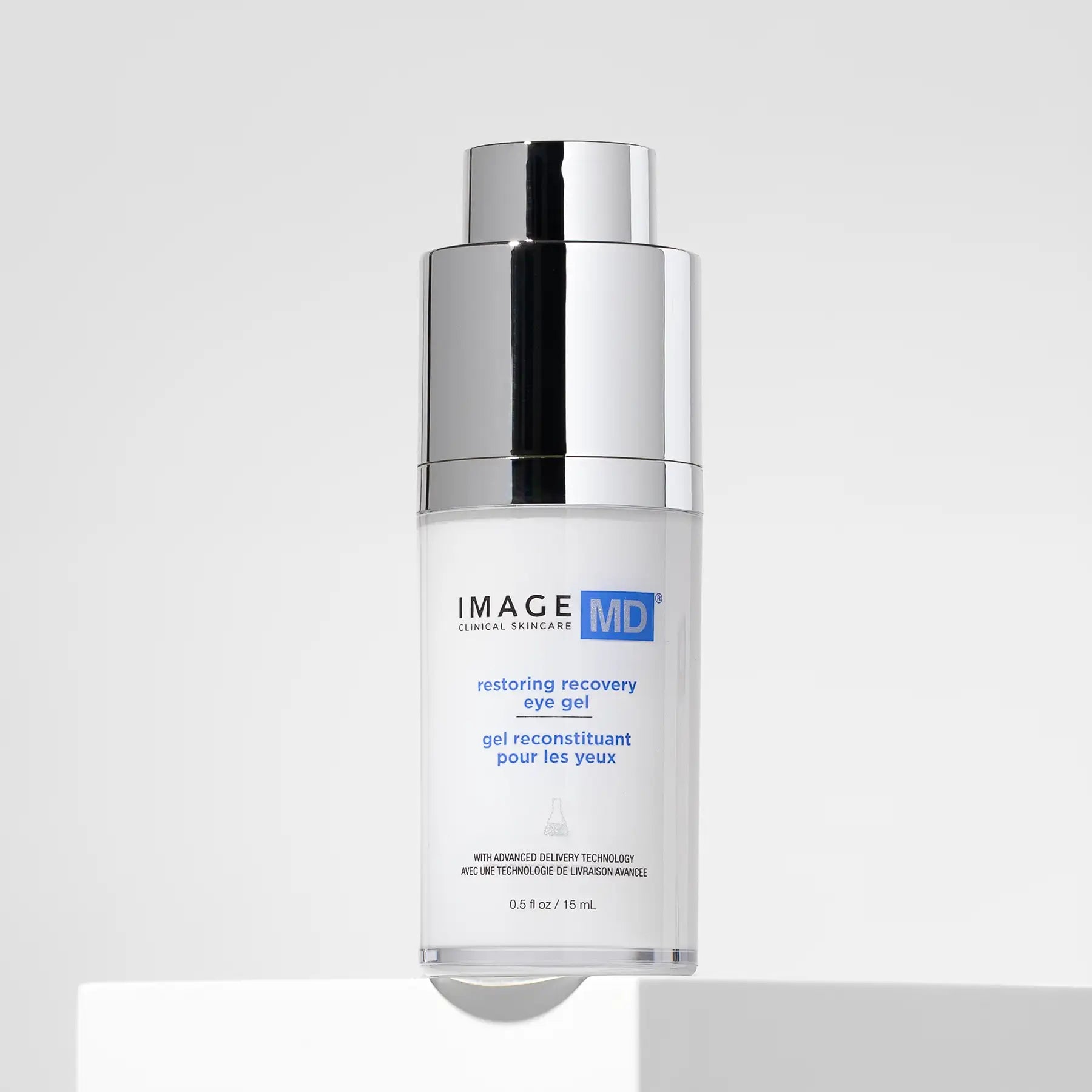 Skincare bottle labeled 'IMAGE MD restoring collagen eye gel' on a light gray background