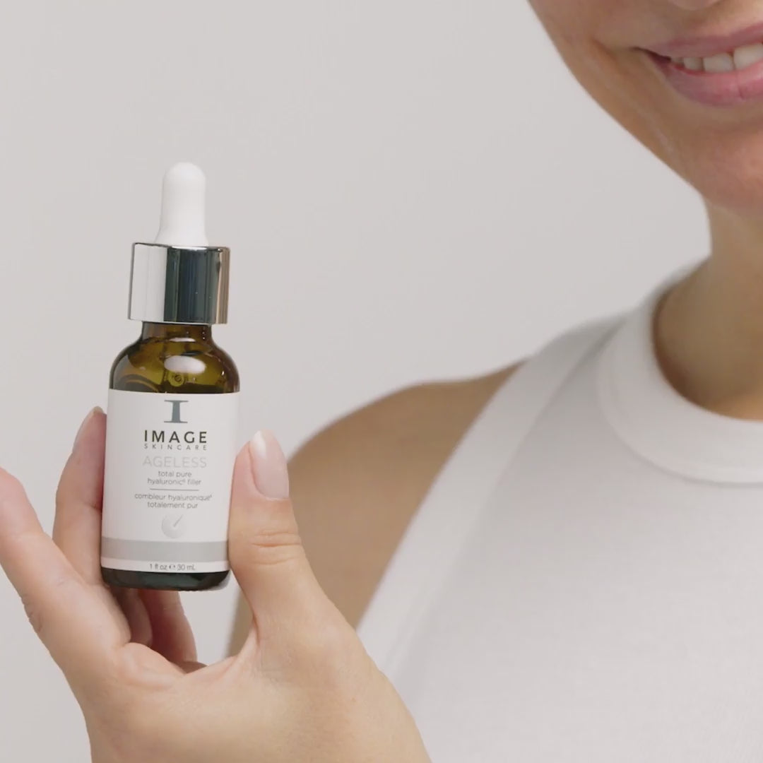 video of model applying serum to face