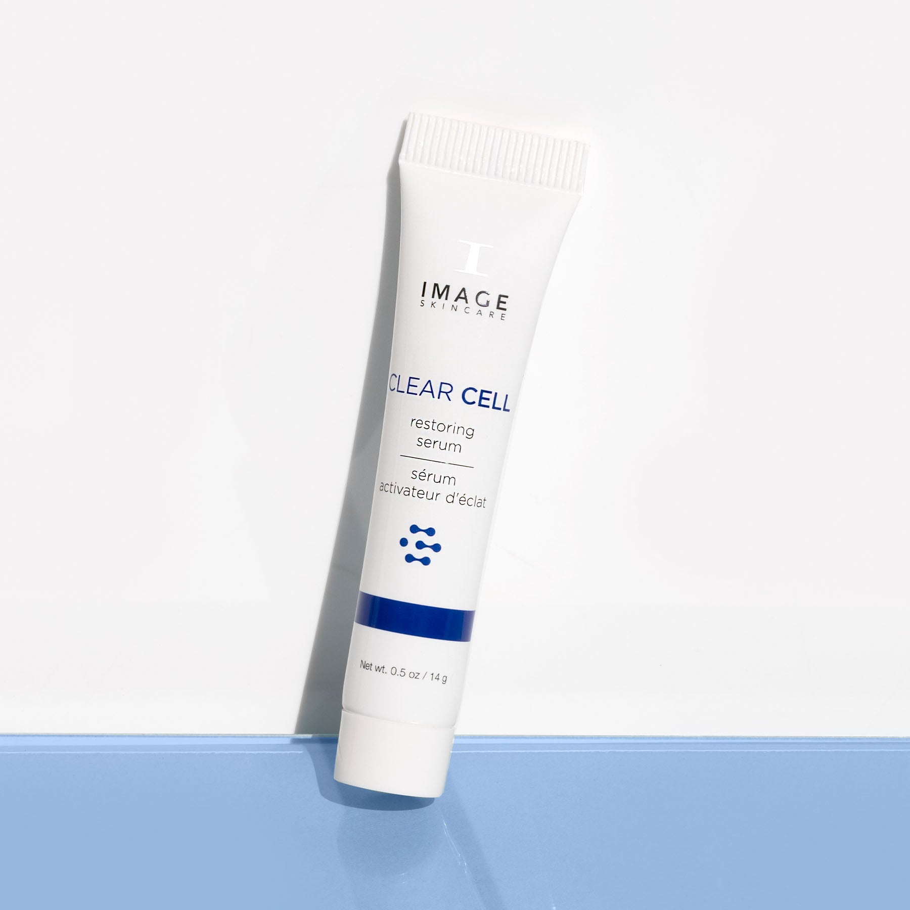 clear cell restoring serum travel size on light background