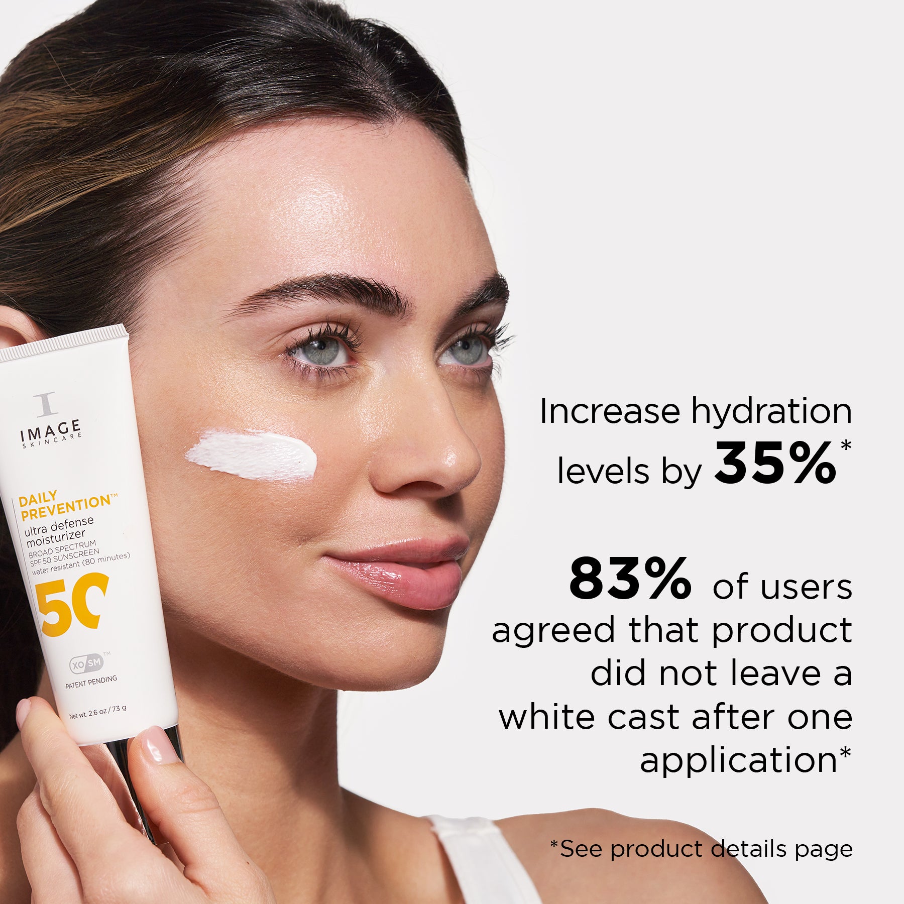Woman applying IMAGE Skincare Daily Prevention Ultra Defense Moisturizer with SPF 50, highlighting increased hydration and no white cast after one use.