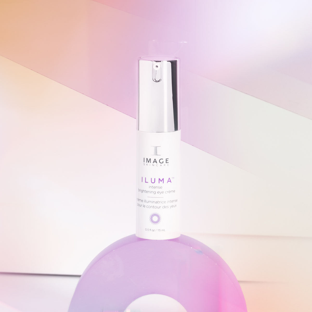 iluma eye creme bottle with purple background