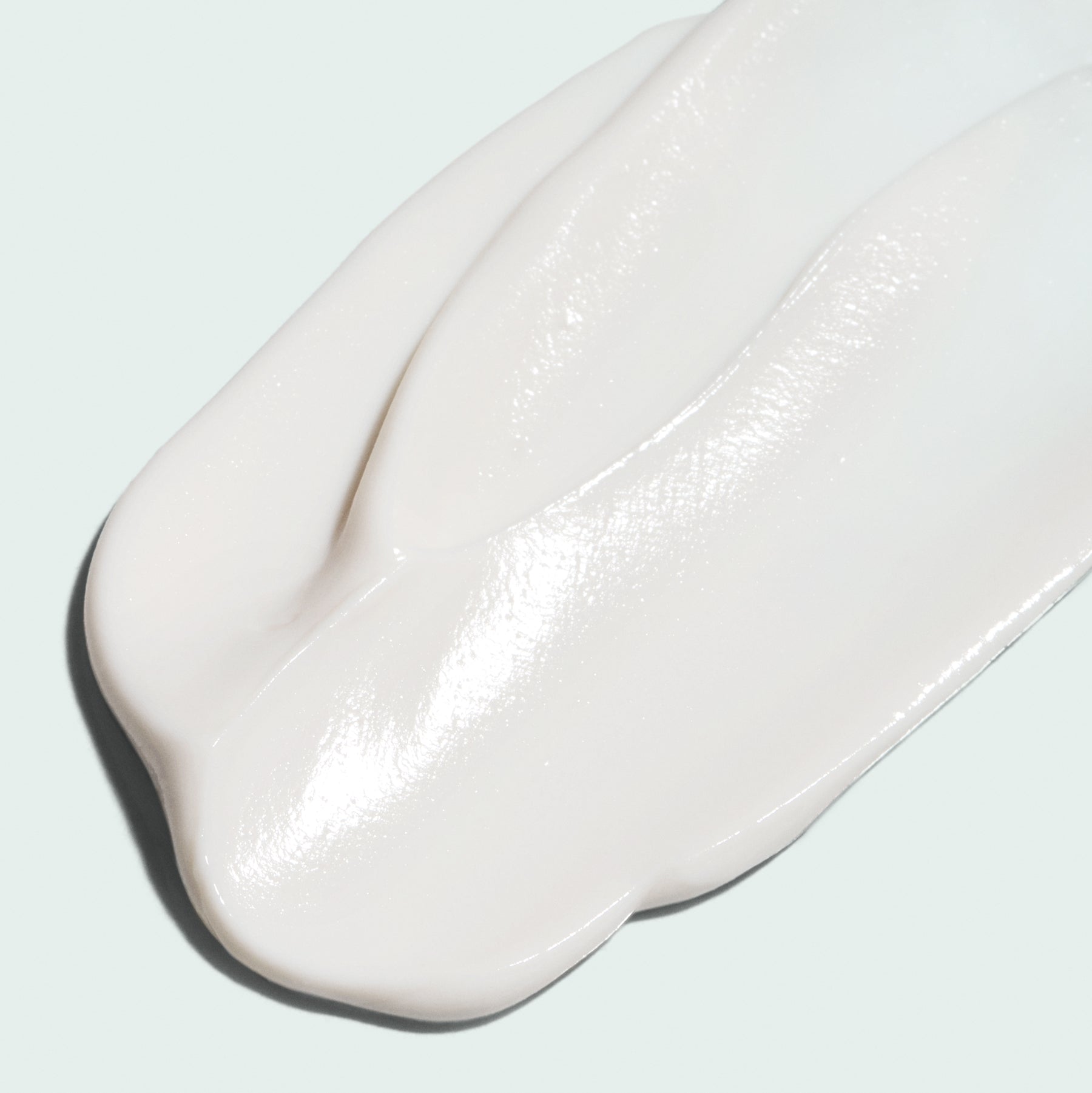 close up texture swatch of masque on light background