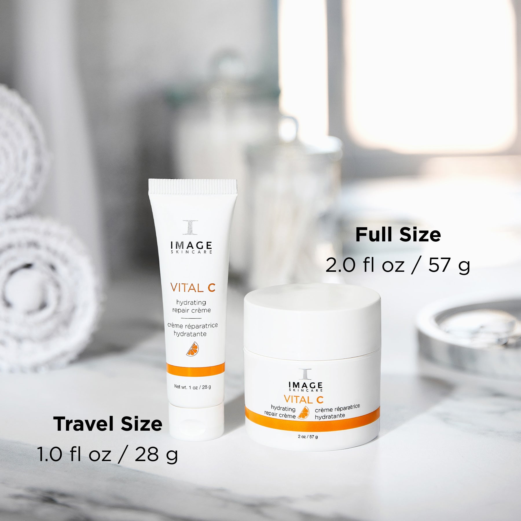 repair creme retail size next to travel size on bathroom counter