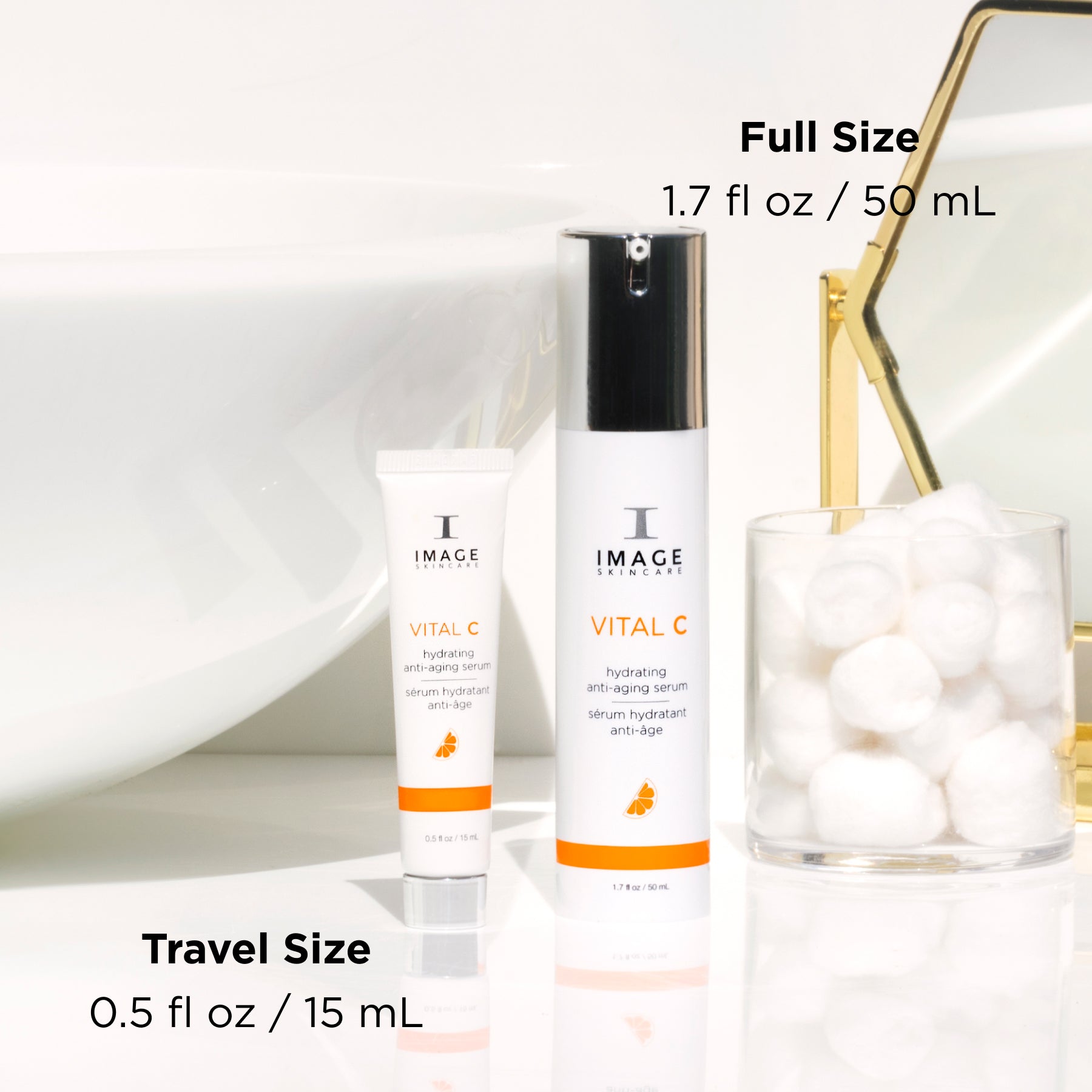 serum retail size next to travel size on bathroom counter