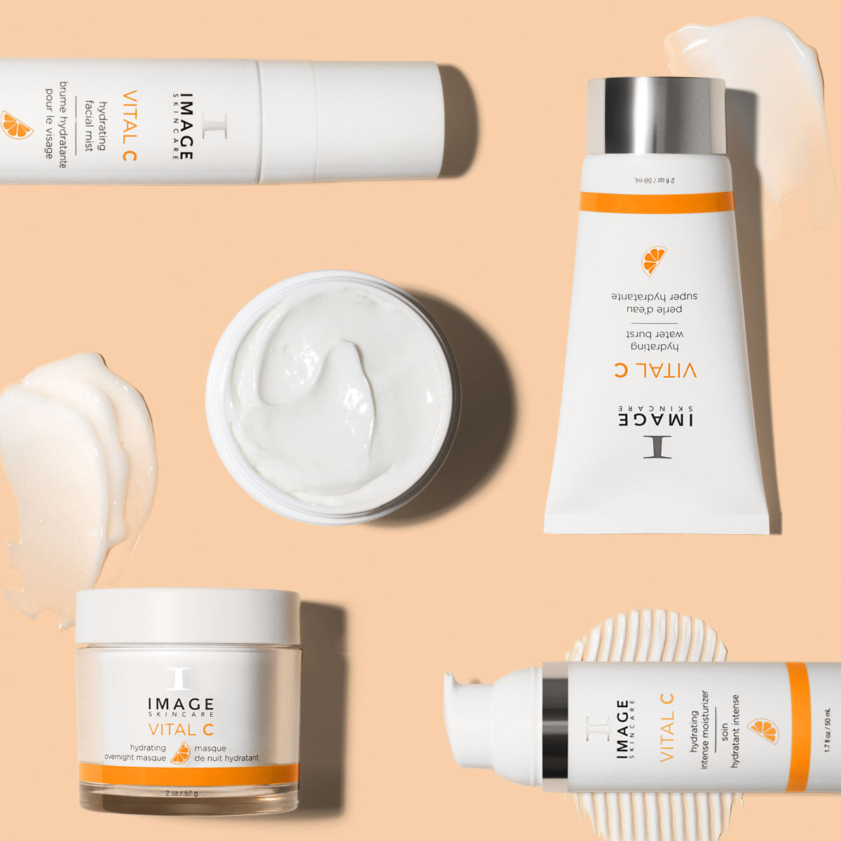 VITAL C retail size products from collection on a light orange background